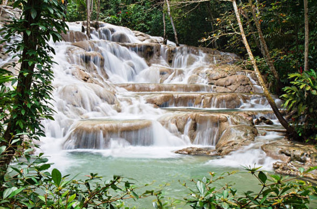 Terraced limestone steps of Dunn's River Falls in Jamaica — a longer transfer option for cruise passengers sailing from Montego Bay